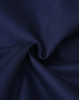 A close-up of navy fabric with a smooth texture, suitable for clothing. The fabric appears durable and lightweight.