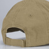 A faded cap in a tan color with a rear adjustable strap.