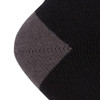 A close-up of a black sock with a grey toe and heel, featuring a logo.