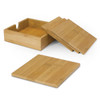 A set of bamboo coasters in natural wood colour, stacked beside a matching bamboo holder.
