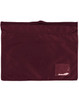 A maroon satchel with a textured surface and a small patch. It has a top opening and no visible logos.