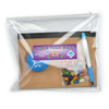 A clear zippered pouch containing a blue stress ball, a pen, a packet of colorful candies, and a brown notepad.