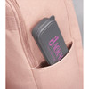 A grey cutlery case with a pink logo tucked into a light pink bag pocket.