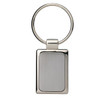 A rectangular silver keyring with a smooth, brushed metal surface and a circular ring for attaching keys.