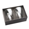 A glass coffee and tea set featuring two clear glasses, presented in a sleek black box with foam insert.