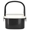 A plastic and wheat straw lunch box in black with a white lid and a black handle. Features a logo.