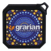 A square Bluetooth speaker with a vibrant circular pattern in blues, yellows, and oranges, featuring a logo.