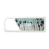 A white Bluetooth speaker featuring a palm tree design on the front and a handle for portability.