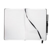 A black bound journal with lined pages, featuring a ribbon bookmark and a pen attached.