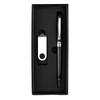 A black pen and silver USB drive are presented in a black gift box with a sleek design.