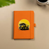 An orange hard-bound journal featuring an illustration of a dump truck, with an elastic closure.