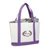 A large tote bag in white with purple handles, featuring a logo and filled with magazines.