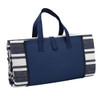A folded picnic rug featuring a navy blue and white striped design, complete with sturdy handles.