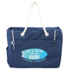 A navy blue waterproof beach bag with rope handles and a front pocket, featuring a logo on the side.
