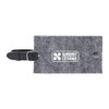 A grey recycled felt luggage tag with a black strap and a logo on the front.