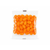 A clear cello bag filled with bright orange jelly beans.