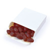 A white box filled with red jelly beans spilling out, featuring a simple design without any branding.
