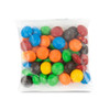 A clear cello bag filled with colorful M&M's in blue, green, red, orange, yellow, and black.