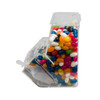 A dispenser filled with assorted color mini jelly beans, featuring vibrant shades of blue, pink, orange, and white.