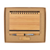 A bamboo notebook, pen, and pencil set in a brown cardboard gift box. Features a spiral binding and a minimalist design.