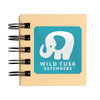 A tan sticky note pad with a spiral binding featuring an elephant logo on a turquoise background.
