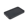 A black wireless power bank with a slim design and an integrated USB port. It features a discrete logo.
