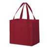 A red non-woven tote bag with dual handles and a square design, featuring a brand logo.