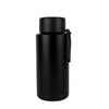 A drink bottle in matte black stainless steel with a lid and a strap. It has a minimalist design and a logo.