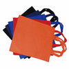 A collection of colourful reusable bags in orange, blue, black, and red with handles, stacked together.