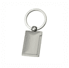 A silver keyring featuring a rectangular pendant attached to a circular ring. The pendant has a sleek, minimalist design.
