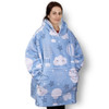 A blue blanket hoodie featuring cloud and balloon patterns, equipped with a front pocket and a hood.