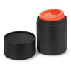 A drink bottle with an orange lid and a black container, featuring a logo on the surface.