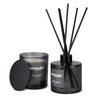 A black candle and diffuser set featuring a whisky and orange scent, with a sleek design and branding visible.