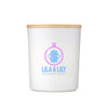 A large glass candle with a white exterior and a wooden lid, featuring a branding logo.