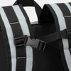 A close-up of the straps and buckle of a black and grey cooler toting bag featuring reflective elements.
