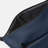 A soft-touch navy toiletry bag with a patterned interior and a zippered opening. It features a logo.
