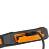 A solar power bank in black and orange with a USB port and cable connected. It has a rugged design.
