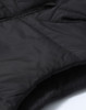 A close-up of a black insulated puffer vest featuring a 3D cut and a textured fabric. The image includes branding.
