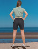 Unisex mercerised cotton shorts in dark colour, featuring a simple design and elastic waistband.