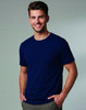 Men's premium cotton short sleeve T-shirt in a soft green shade, featuring a logo, worn by a man on a sailboat.