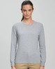 A long-sleeve tee shirt in light grey, featuring a round neckline and a fitted design. It has a logo on the chest.