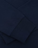 A navy blue long sleeve tee shirt featuring close-up details of the fabric and cuffs, with a logo present.