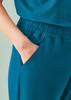 Teal women's jogger scrub pant featuring an elastic waistband and side pocket for convenience.