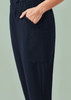 A navy blue women's jogger scrub pant featuring a side pocket and an elastic waistband.