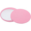 A pink round makeup mirror with a smooth exterior, featuring a reflected side and a plain side.