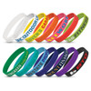 A collection of silicone wristbands in various colours, featuring debossed text and logos.