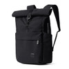 A black rolltop backpack with a front pocket and shoulder straps, featuring a logo on the side.