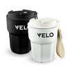 A double wall coffee cup set in black and white, featuring a lid and a strap, with a logo.