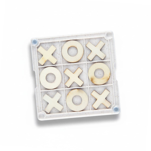A Tic Tac Toe board game coaster featuring a white and natural wood design with X and O pieces. It has a clear protective cover.