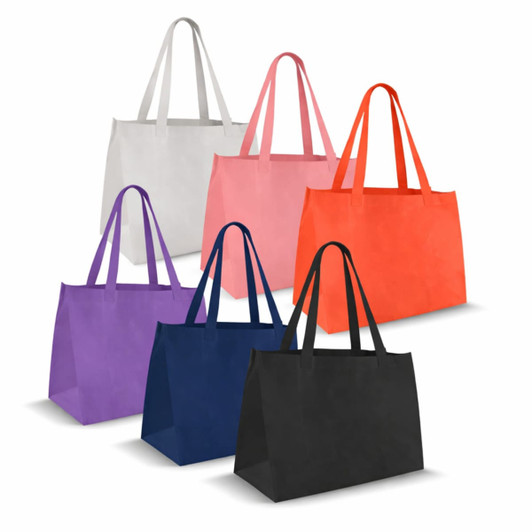 A collection of medium non-woven tote bags in white, pink, orange, purple, navy, and black, featuring various handles and designs.